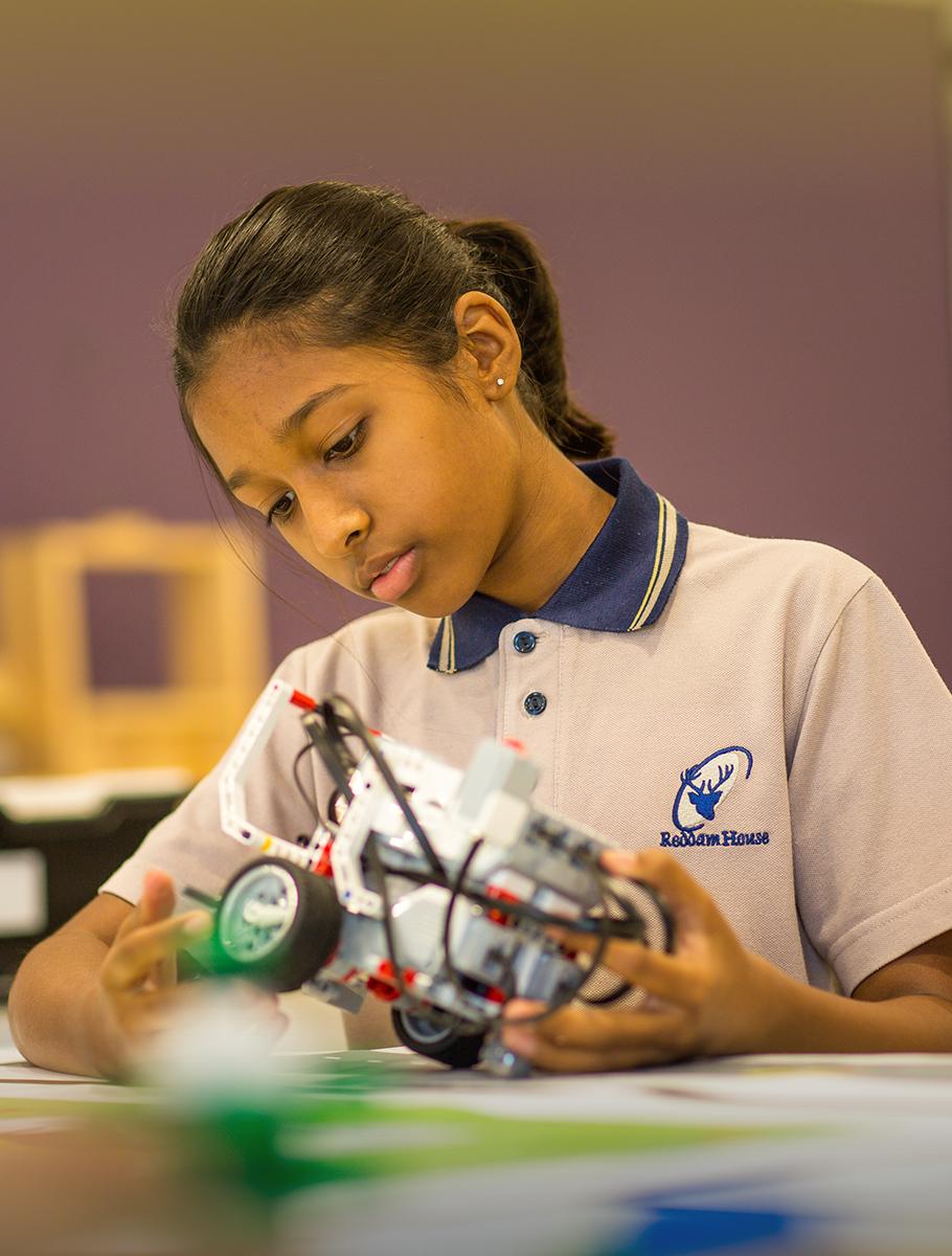 Student working with robotics