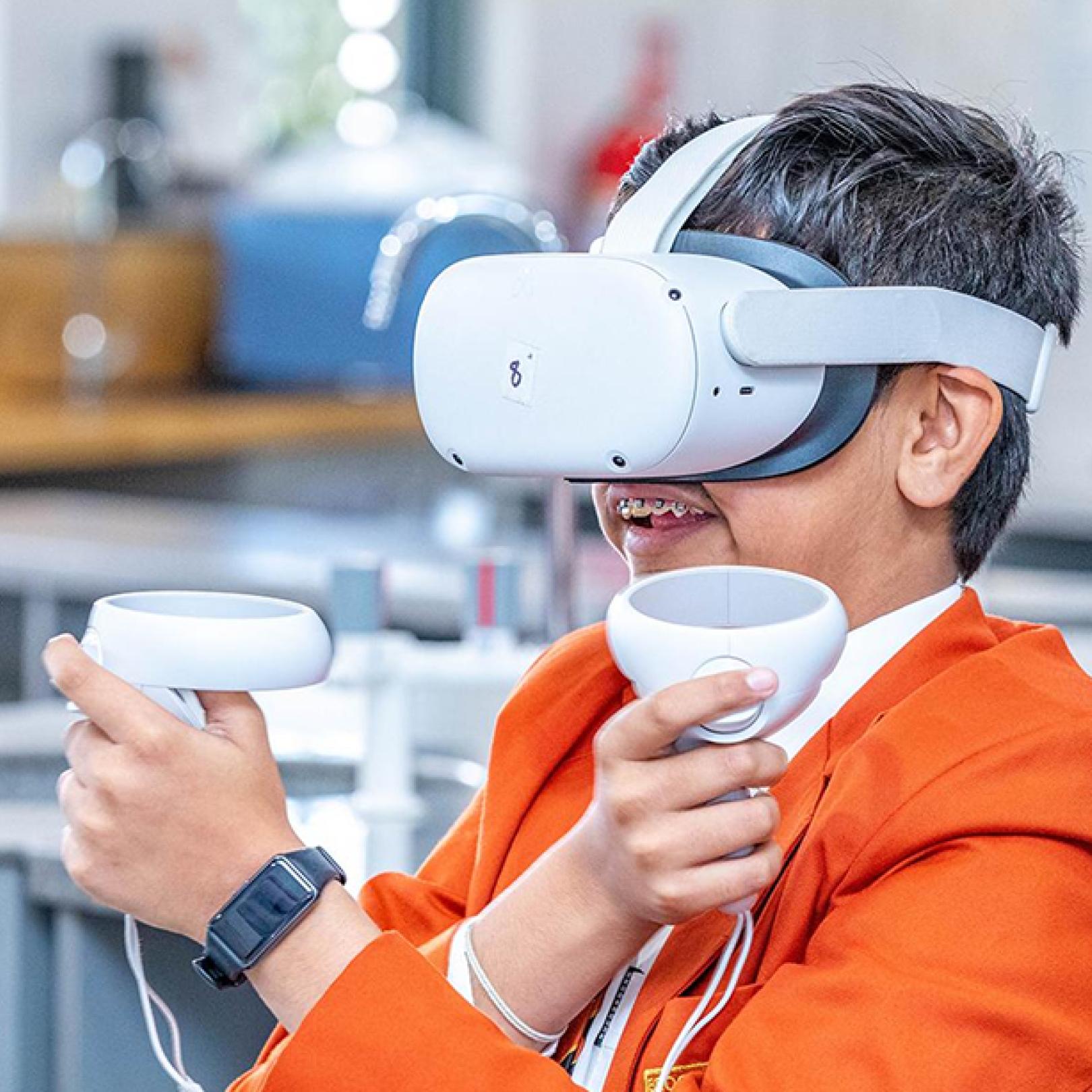 Child wearing VR goggles
